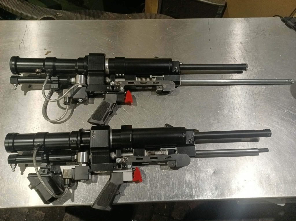Warchlak pneumatic counter-UAS prototypes on a workshop bench
